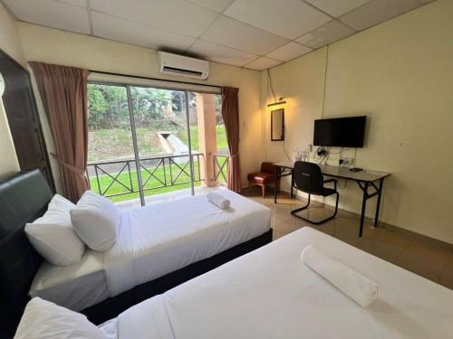 Imagen general del Hotel Capital O 91096 Usas Resort. Foto 3