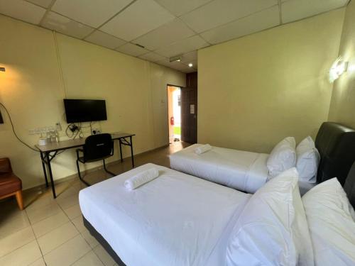 Imagen general del Hotel Capital O 91096 Usas Resort. Foto 4