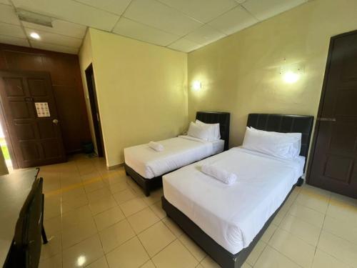 Imagen general del Hotel Capital O 91096 Usas Resort. Foto 6