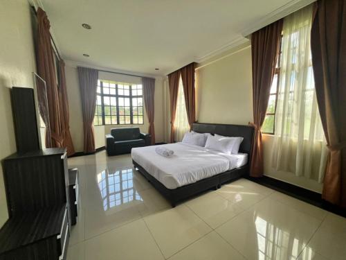 Imagen general del Hotel Capital O 91096 Usas Resort. Foto 7