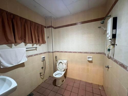 Imagen de la habitación del Hotel Capital O 91096 Usas Resort. Foto 19