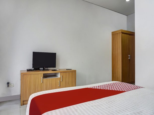 Imagen de la habitación del Hotel Capital O 91140 Ayodya Kebon Jeruk, Yakarta Barat. Foto 12
