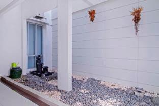Imagen de la habitación del Hotel Capital O 91140 Ayodya Kebon Jeruk, Yakarta. Foto 14