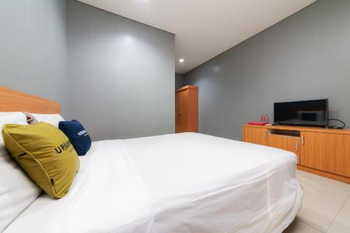 Imagen de la habitación del Hotel Capital O 91140 Ayodya Kebon Jeruk, Yakarta. Foto 18