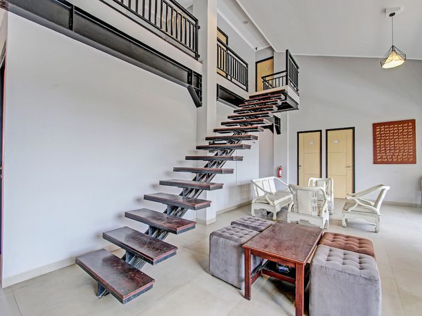 Imagen de los interiores del Hotel Capital O 91377 Mk Prime Syariah. Foto 13