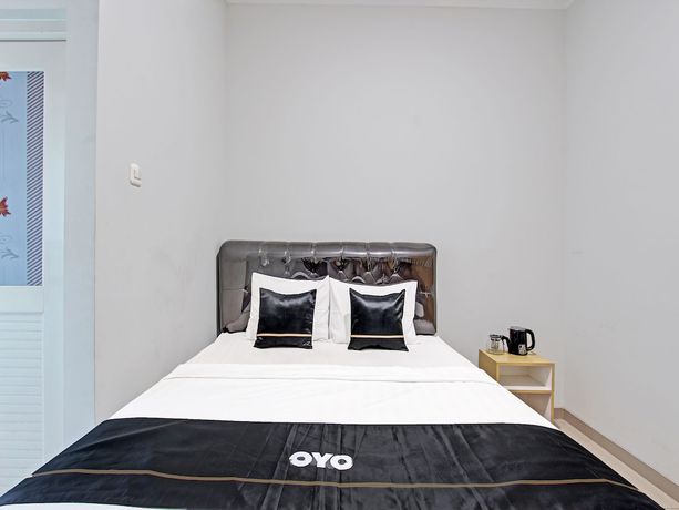 Imagen de la habitación del Hotel Capital O 91377 Mk Prime Syariah. Foto 3