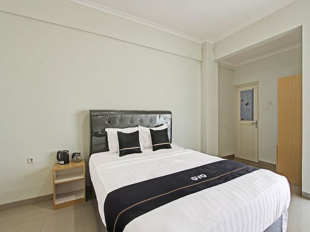 Imagen de la habitación del Hotel Capital O 91377 Mk Prime Syariah. Foto 4