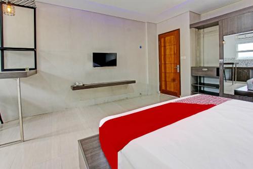 Imagen general del Hotel Capital O 91384 Rintaka Residence. Foto 11