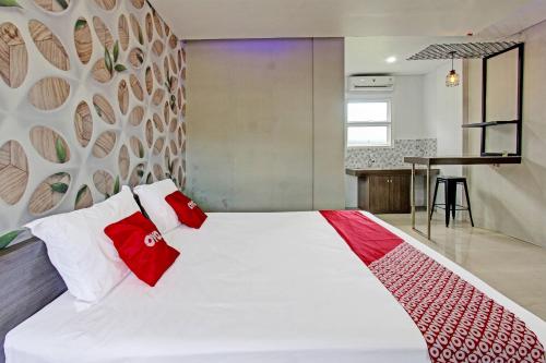 Imagen general del Hotel Capital O 91384 Rintaka Residence. Foto 13