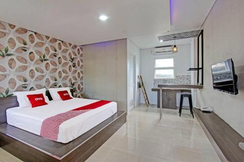 Imagen general del Hotel Capital O 91384 Rintaka Residence. Foto 14
