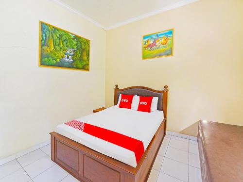 Imagen de la habitación del Hotel Capital O 91406 Agus Jaya Residence. Foto 20