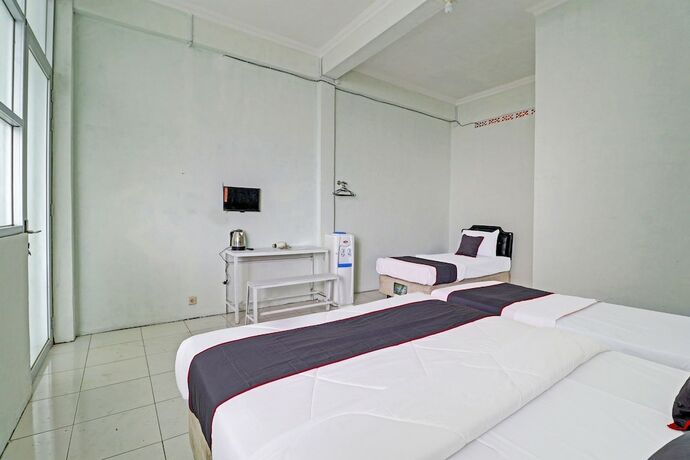 Imagen de la habitación del Hotel Capital O 91466 Neu Backpacker Tf Syariah (smk Tb). Foto 15