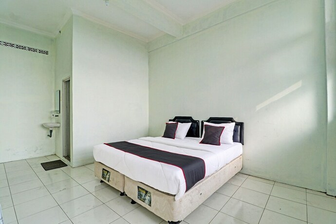 Imagen de la habitación del Hotel Capital O 91466 Neu Backpacker Tf Syariah (smk Tb). Foto 18