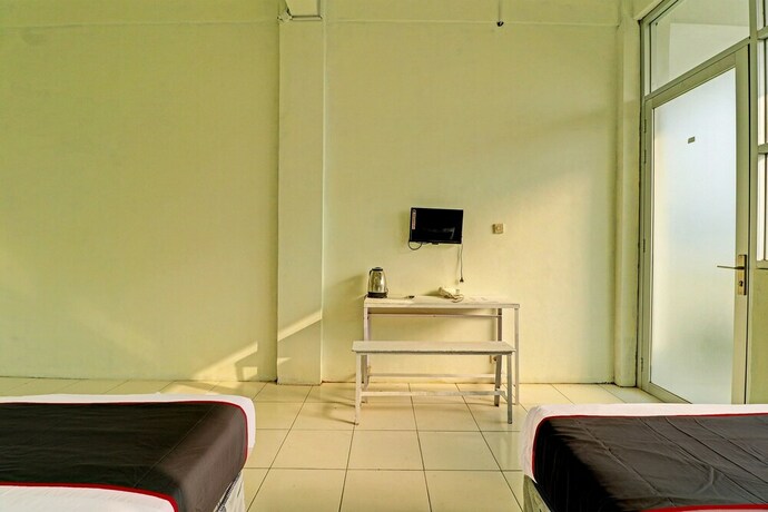 Imagen de la habitación del Hotel Capital O 91466 Neu Backpacker Tf Syariah (smk Tb). Foto 19