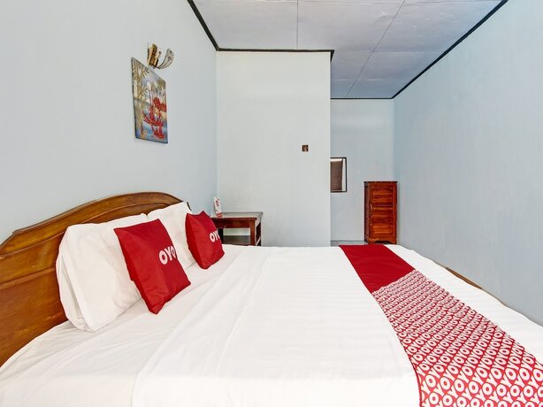 Imagen de la habitación del Hotel Capital O 91644 Loka Hause. Foto 11