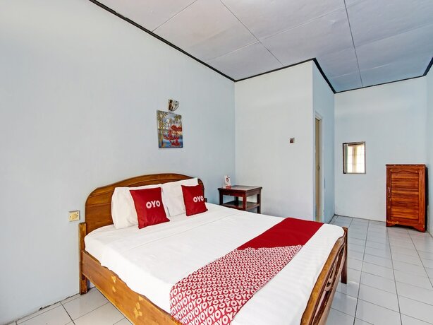 Imagen de la habitación del Hotel Capital O 91644 Loka Hause. Foto 15