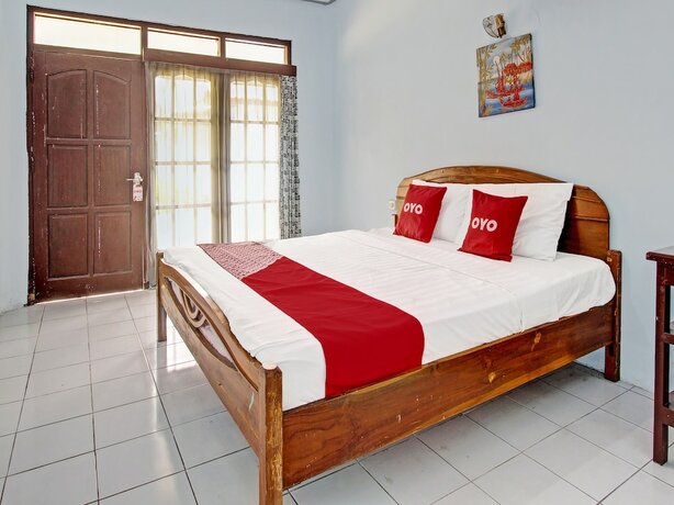 Imagen de la habitación del Hotel Capital O 91644 Loka Hause. Foto 16