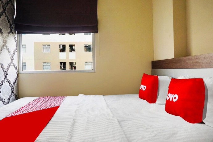 Imagen de la habitación del Hotel Capital O 91651 Independent99. Foto 7