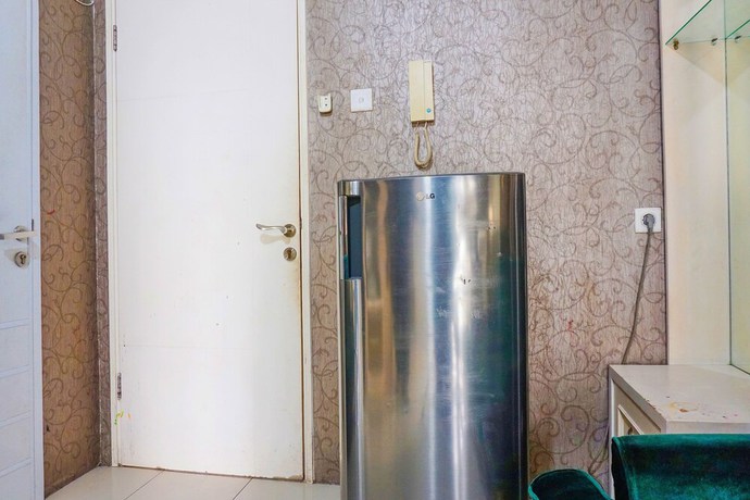 Imagen de la habitación del Hotel Capital O 91651 Independent99. Foto 11