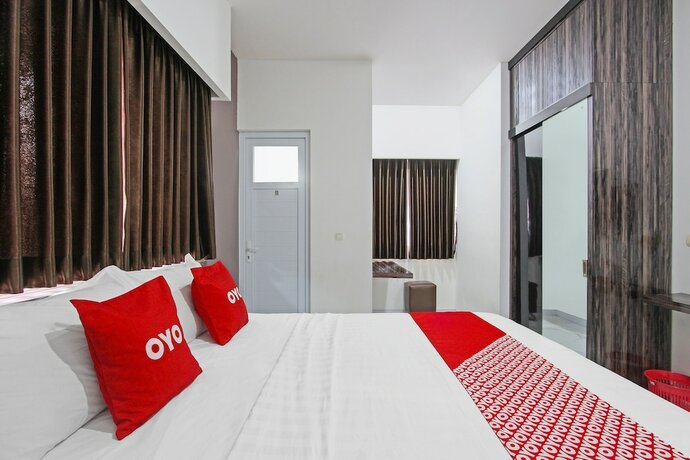 Imagen de la habitación del Hotel Capital O 91665 D\'prof Exclusive Guesthouse. Foto 19