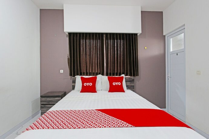 Imagen de la habitación del Hotel Capital O 91665 D\'prof Exclusive Guesthouse. Foto 20