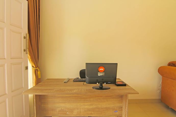 Imagen de los interiores del Hotel Capital O 91675 Utama Residence. Foto 15