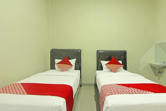Imagen de la habitación del Hotel Capital O 91675 Utama Residence. Foto 4