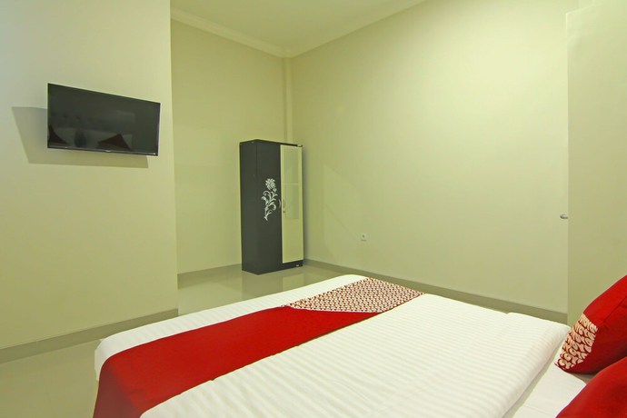 Imagen de la habitación del Hotel Capital O 91675 Utama Residence. Foto 5