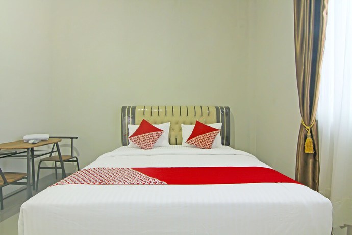 Imagen de la habitación del Hotel Capital O 91675 Utama Residence. Foto 10