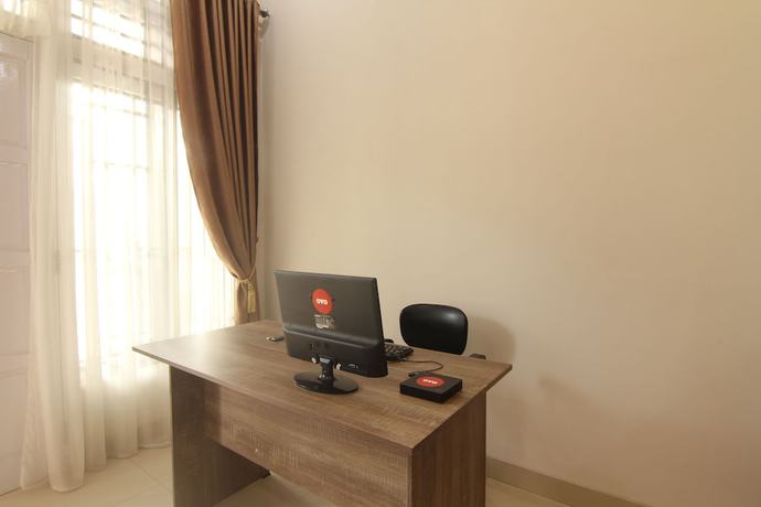 Imagen de los interiores del Hotel Capital O 91675 Utama Residence. Foto 19