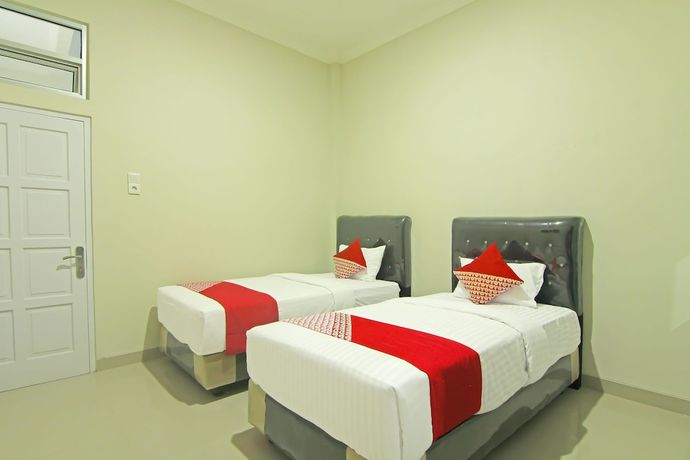 Imagen de la habitación del Hotel Capital O 91675 Utama Residence. Foto 14