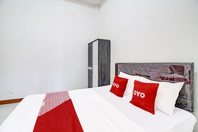 Imagen de la habitación del Hotel Capital O 91690 Moza Guest House. Foto 16