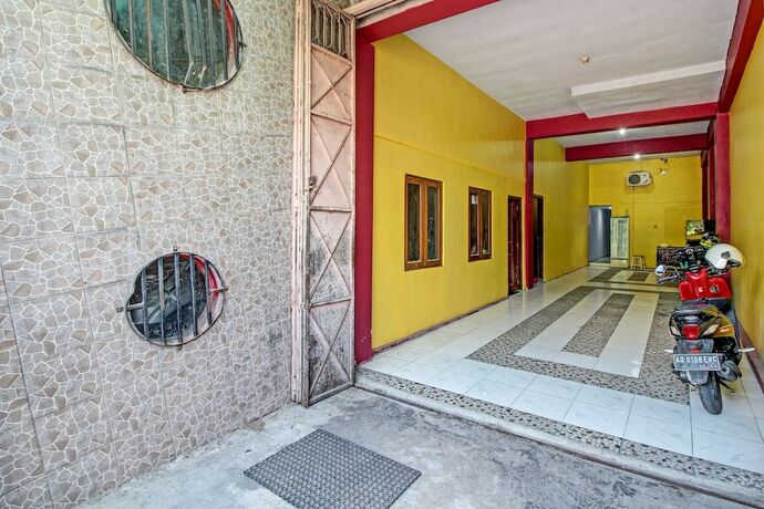 Imagen general del Hotel Capital O 91690 Moza Guest House. Foto 9