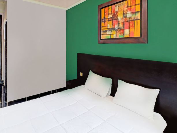 Imagen de la habitación del Hotel Capital O 91836 Pondok Bambu. Foto 2