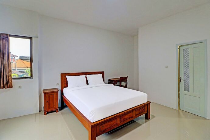 Imagen de la habitación del Hotel Capital O 92039 Runways House. Foto 19