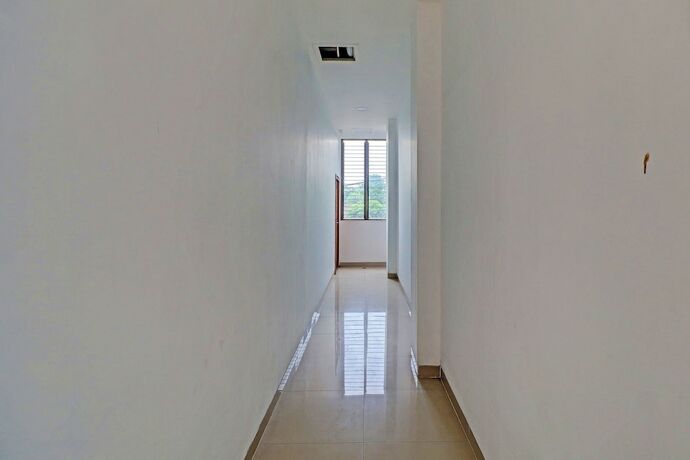 Imagen general del Hotel Capital O 92039 Runways House. Foto 1