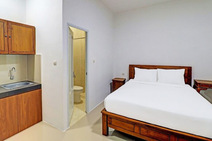 Imagen general del Hotel Capital O 92039 Runways House. Foto 5