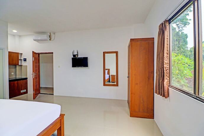 Imagen general del Hotel Capital O 92039 Runways House. Foto 15