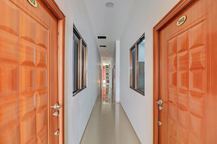 Imagen general del Hotel Capital O 92039 Runways House. Foto 17