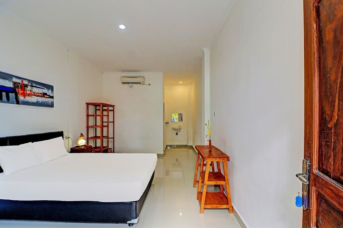 Imagen de la habitación del Hotel Capital O 92094 Kertha. Foto 17