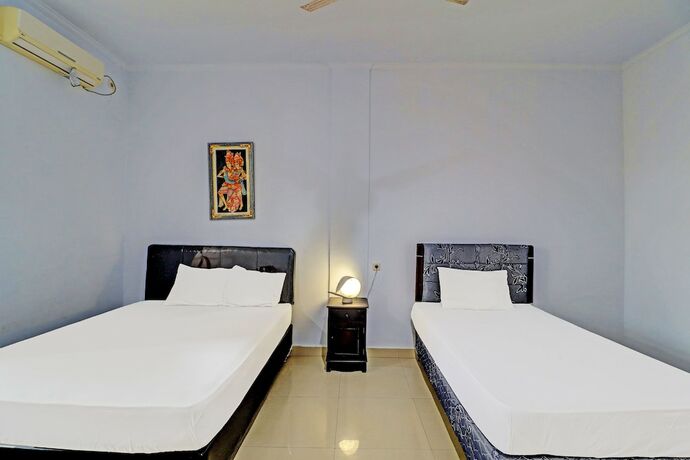 Imagen de la habitación del Hotel Capital O 92094 Kertha. Foto 19