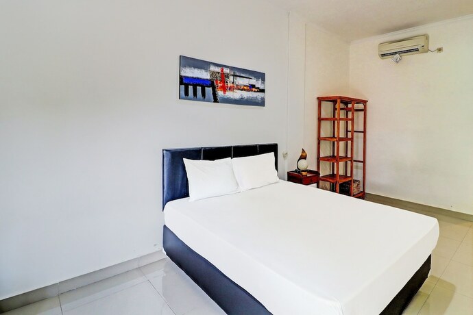 Imagen general del Hotel Capital O 92094 Kertha. Foto 12