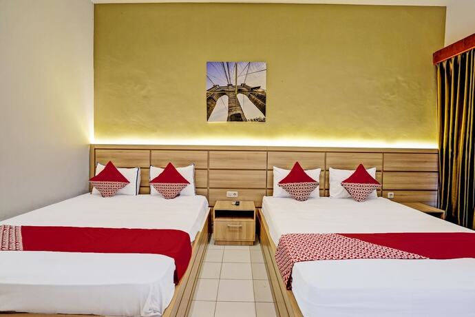 Imagen de la habitación del Hotel Capital O 92162 Wisata Karya. Foto 13
