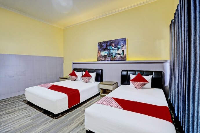 Imagen de la habitación del Hotel Capital O 92162 Wisata Karya. Foto 14