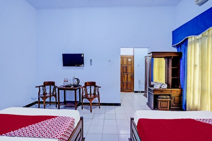 Imagen de la habitación del Hotel Capital O 92162 Wisata Karya. Foto 15