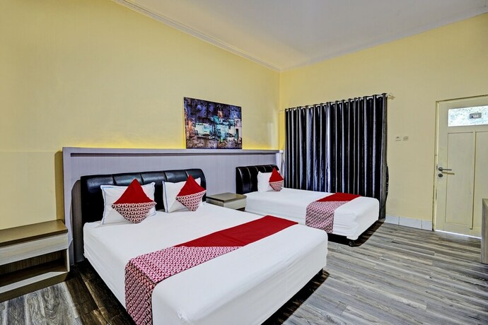 Imagen de la habitación del Hotel Capital O 92162 Wisata Karya. Foto 17
