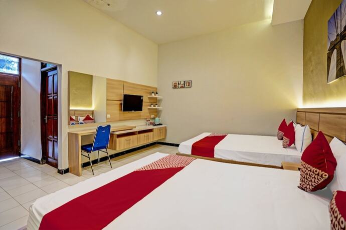 Imagen de la habitación del Hotel Capital O 92162 Wisata Karya. Foto 18