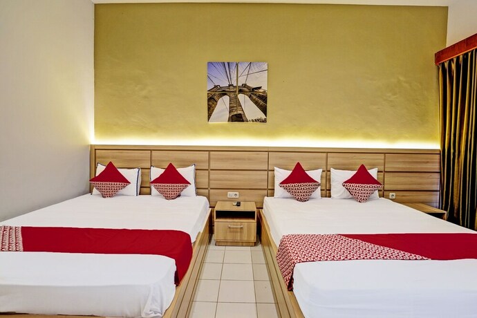 Imagen de la habitación del Hotel Capital O 92162 Wisata Karya. Foto 19