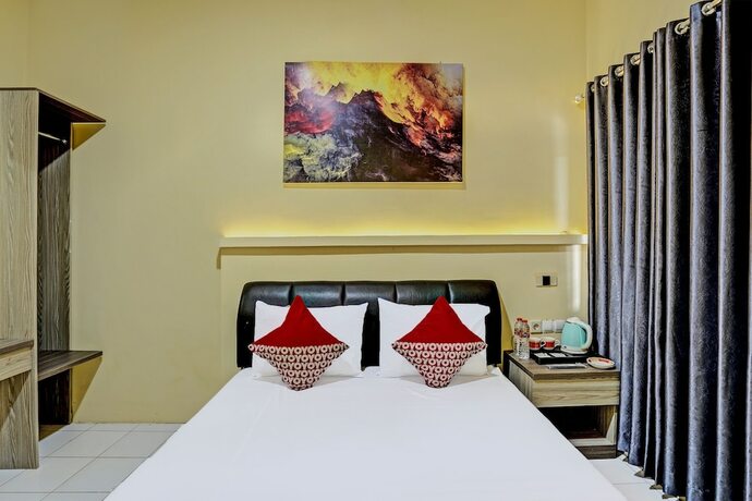 Imagen de la habitación del Hotel Capital O 92162 Wisata Karya. Foto 21