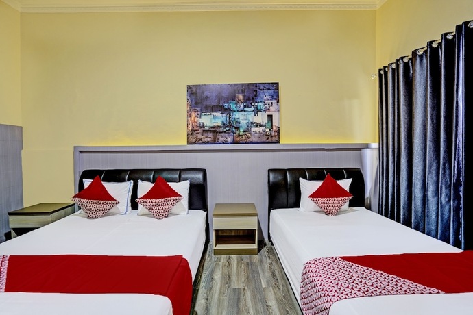 Imagen de la habitación del Hotel Capital O 92162 Wisata Karya. Foto 23